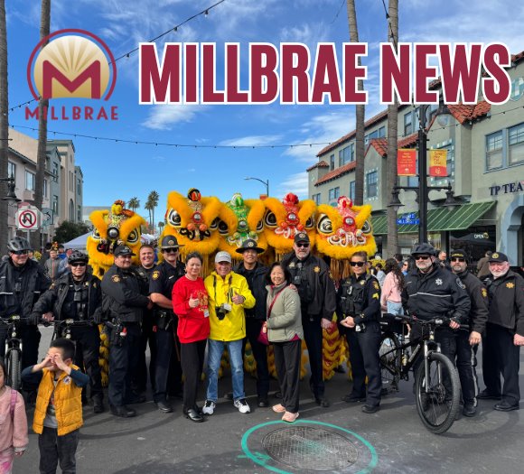 People gather with Deputy Sheriff's for a picture at the Millbrae Lunar New Year Festival. 