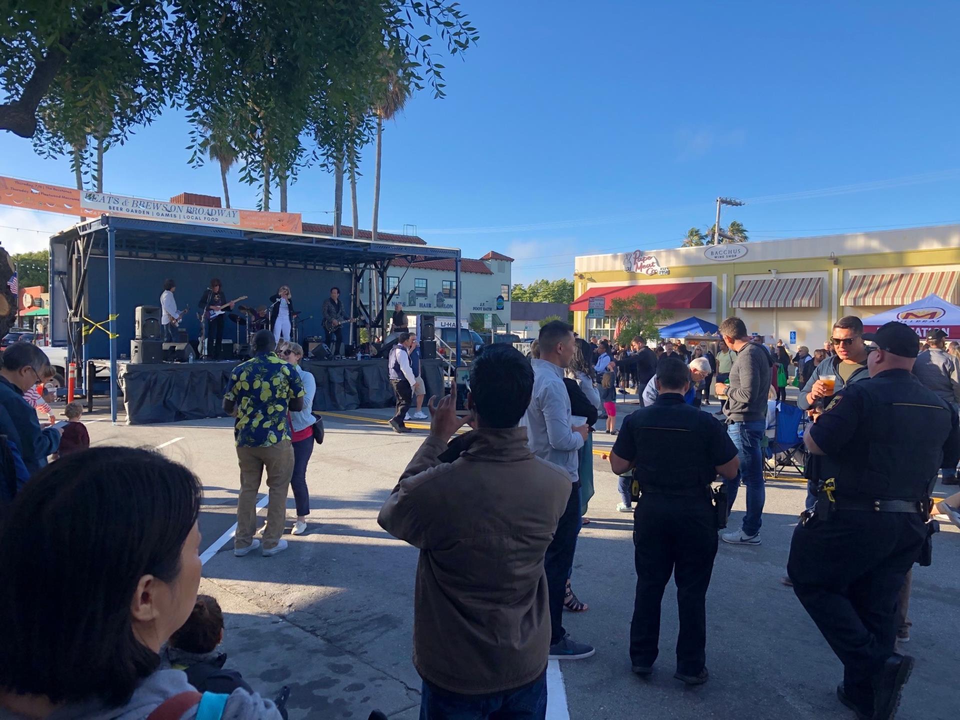 Crowd standing in front of the stage